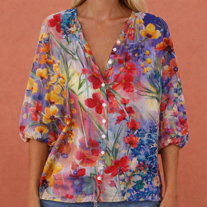 Printed blouse with V-neck and button closure for women | Mireya