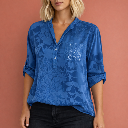 Elegant women's blouse with V-neck and subtle floral texture | Nadine