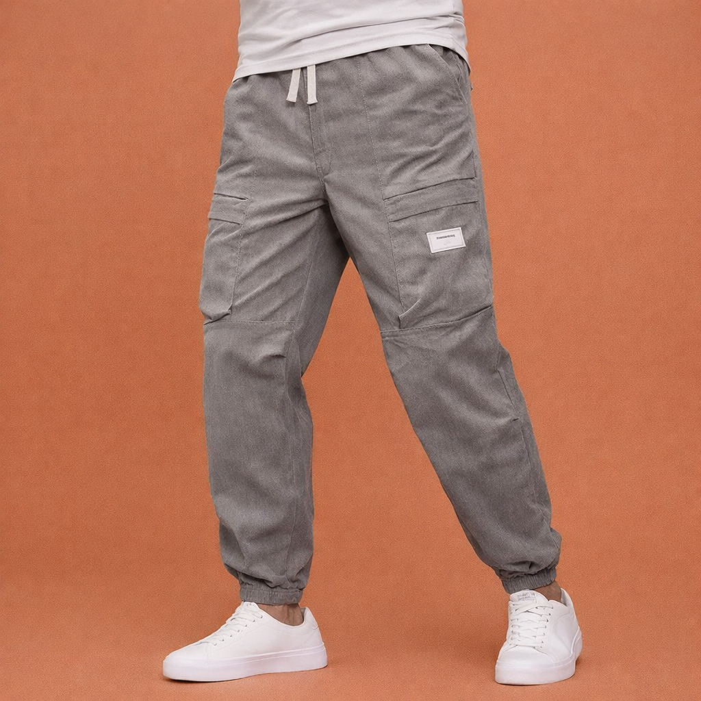 Corduroy pants with multiple pockets and elastic waist for men | Rik