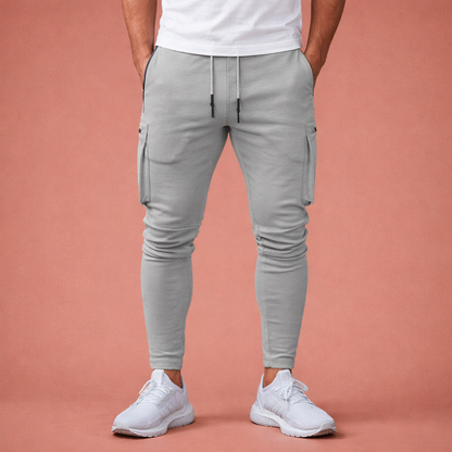 Slim fit jogging pants for men with ankle zippers and multiple pockets | Rens