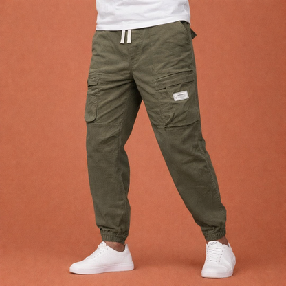 Corduroy pants with multiple pockets and elastic waist for men | Rik