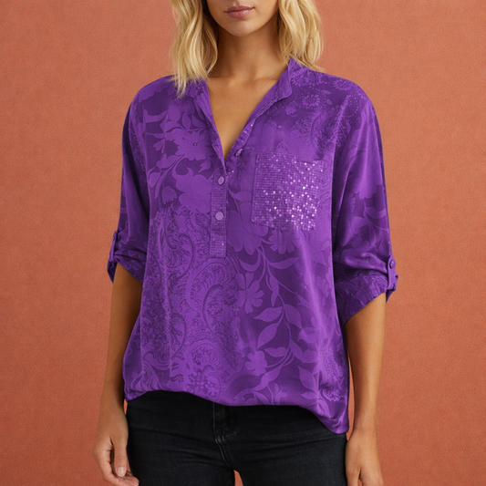 Elegant women's blouse with V-neck and subtle floral texture | Nadine