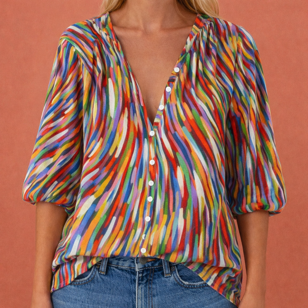 Printed blouse with V-neck and button closure for women | Mireya