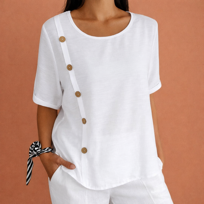 Short sleeve women's blouse with round neck and decorative buttons on the side | Elara