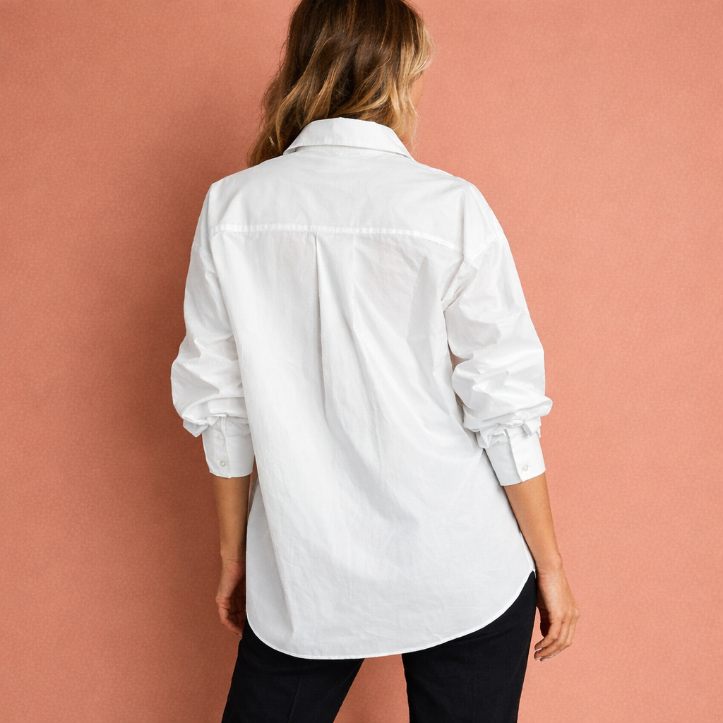 Oversized women's blouse with classic collar and chest pocket | Yfke