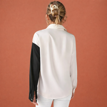 Elegant women's blouse with floral print and button closure | Carlijn